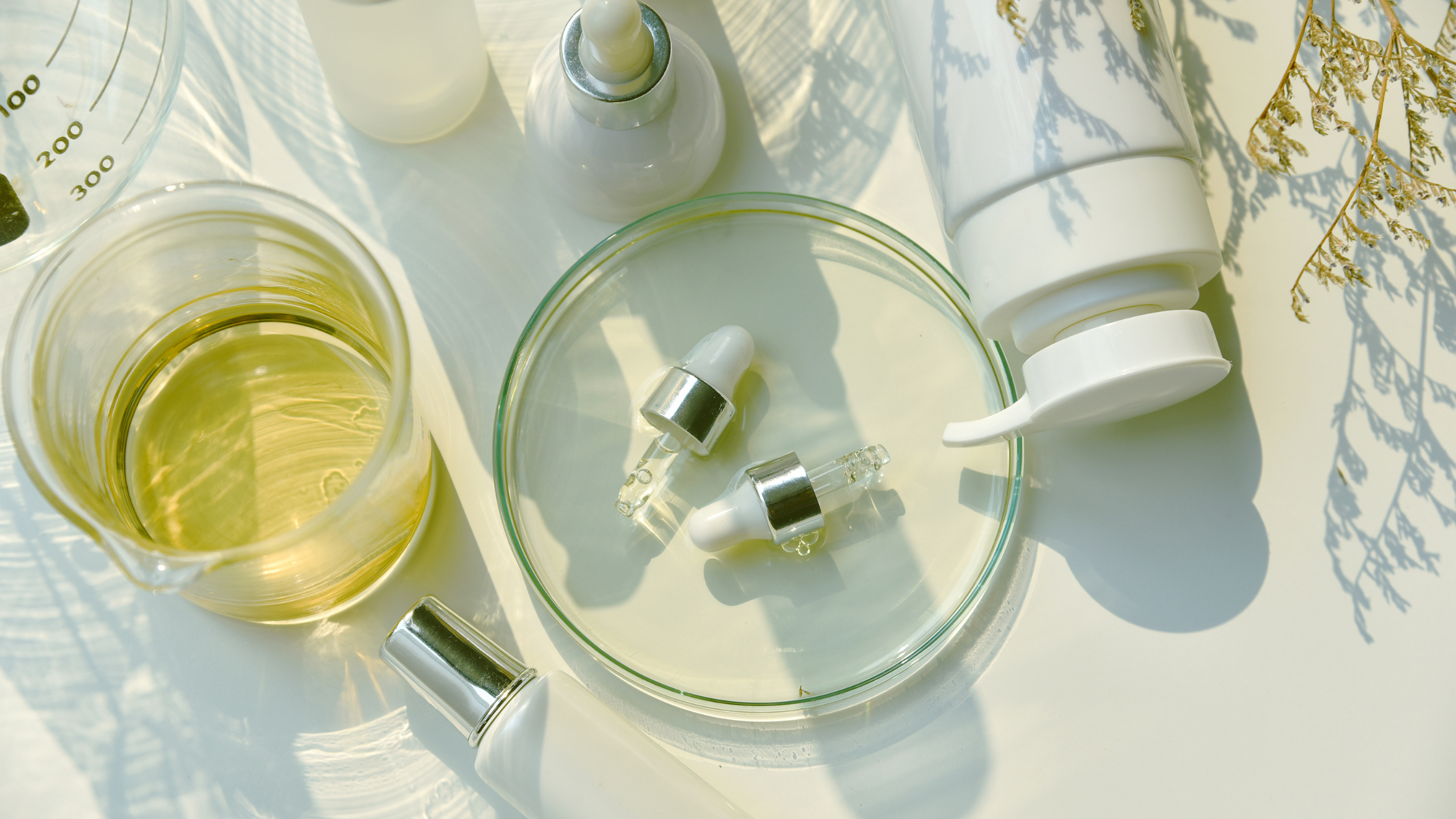 oil based skincare bottles and equipment laid out