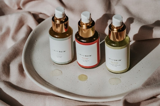 3 natural skincare serums with product displayed