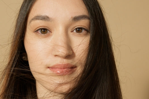 Close up of woman's face staring into camera