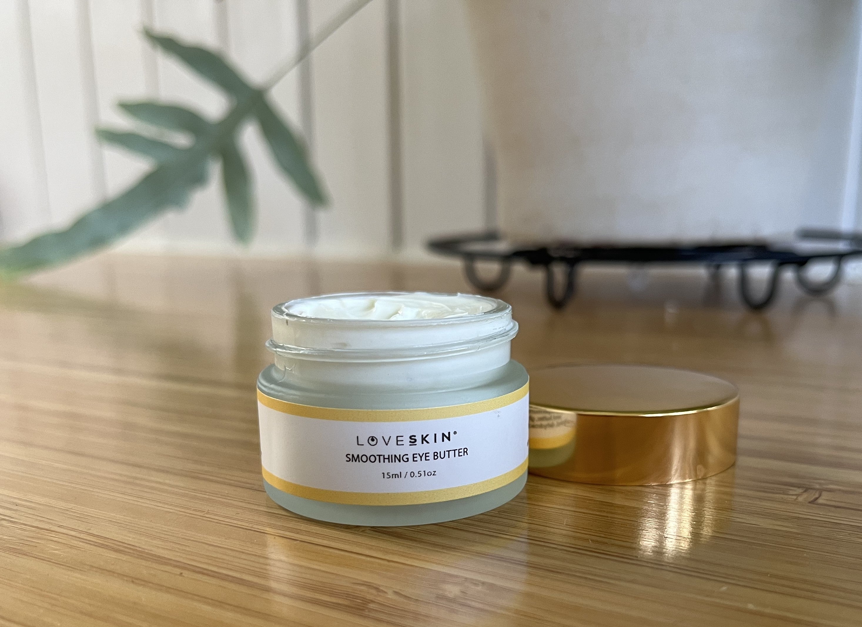 Jar of Smoothing Eye Butter on the counter