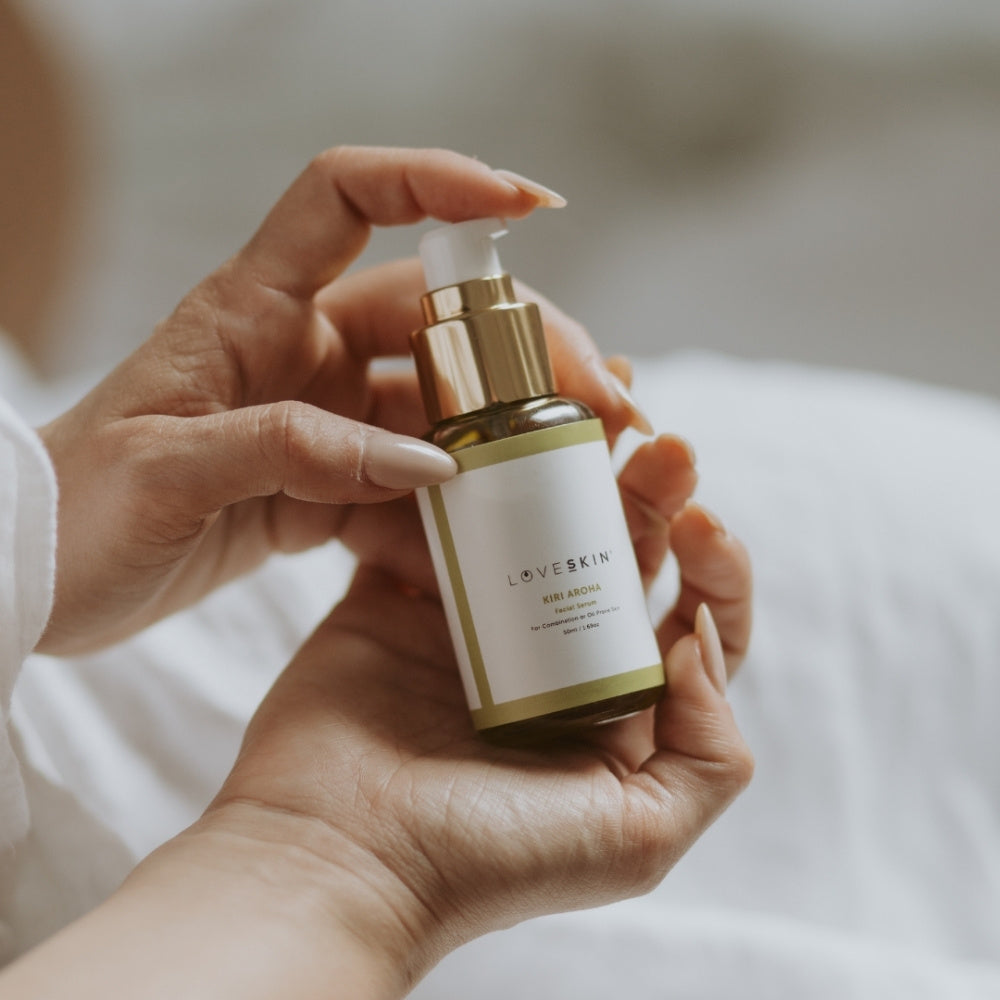 Hands holding Kiri Aroha Facial Serum