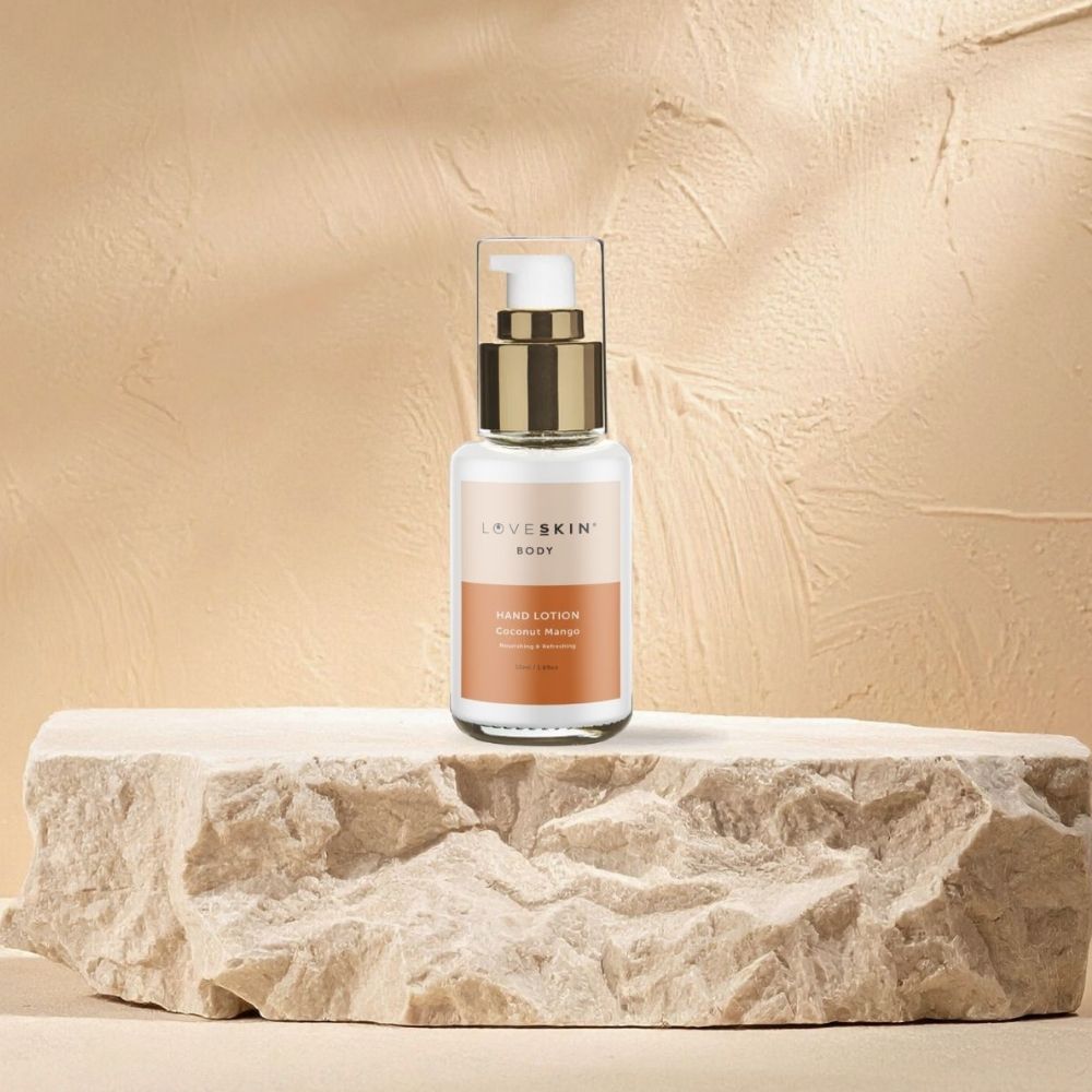Image of a bottle of coconut and mango hand lotion, a non-greasy and hydrating hand cream for soft, nourished skin.