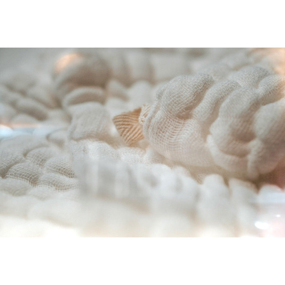 Close-up of textured soft muslin face cloth for loveskin nz
