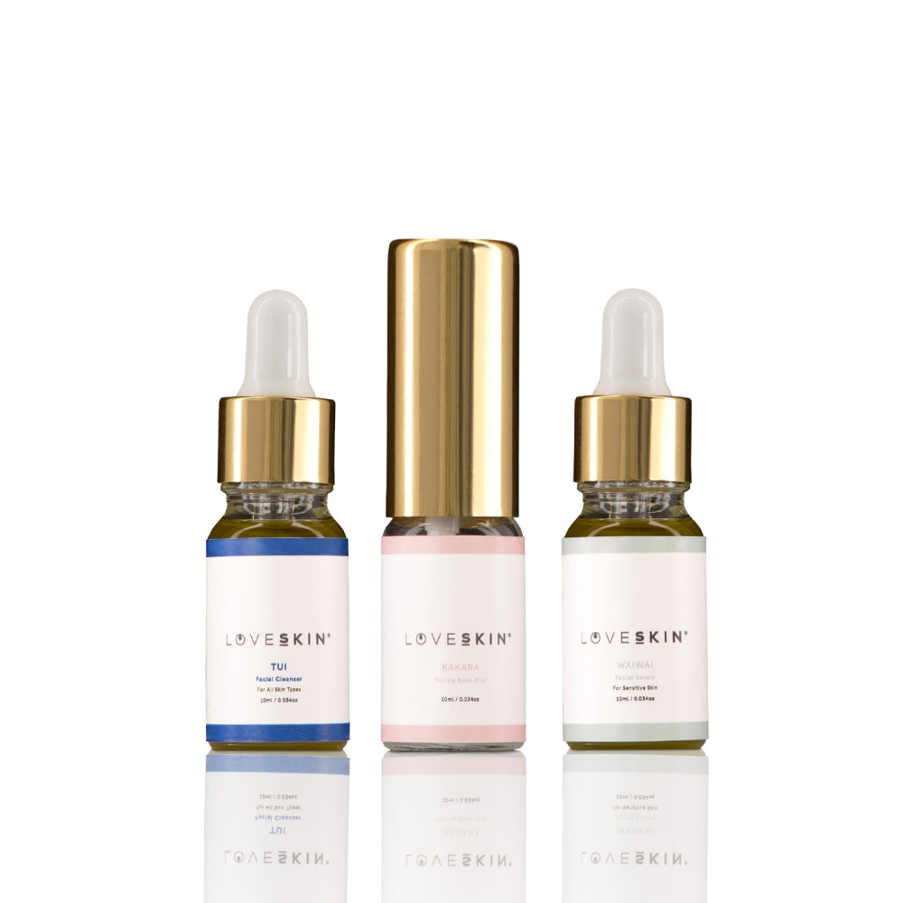 Three LoveSkin skincare bottles with sensitive skin serum on a white background