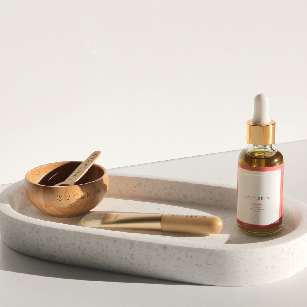NZ Hana Glacial Clay Mask kit with mixing bowl, brush, and Arohanui Facial Serum for clear, balanced skin