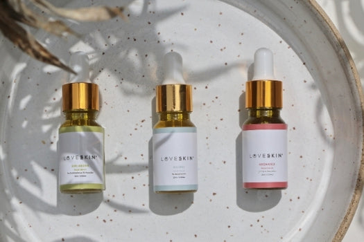 loveksin natural skincare ritual laid out on speckled tray