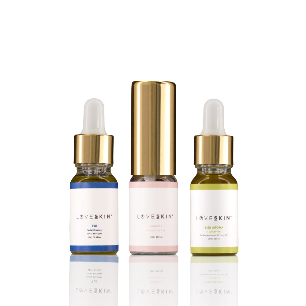 Three LoveSkin skincare bottles with oily skin serum on a white background